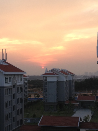 Pink sun looking west over Xiang'an.